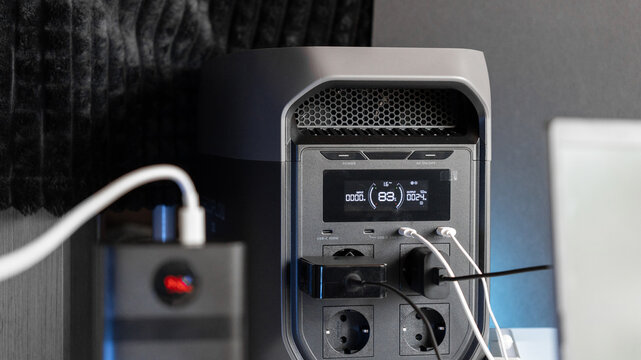 Power bank and portable power station. Concept of backup power and energy independence. Electricity, storage, blackout, battery.