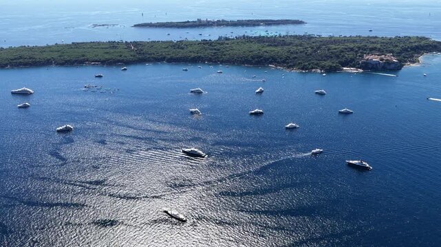 Aerial view of luxury yachts near the coast of Antibes, France.