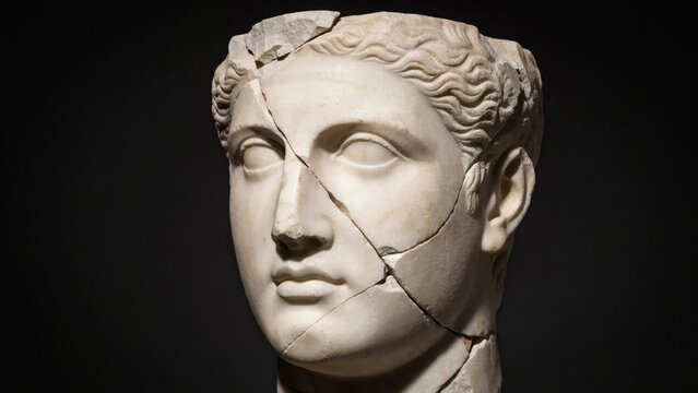 Ancient Greek marble bust of a woman, cracked antique stone head sculpture, classical roman statue portrait on dark background