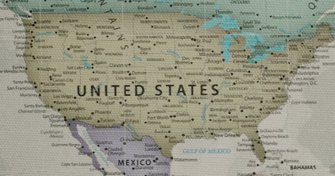 Detailed vintage-style map with a canvas texture, showing the United States of America with its cities and states, slowly scrolling southwards to reveal Mexico and the Gulf of Mexico