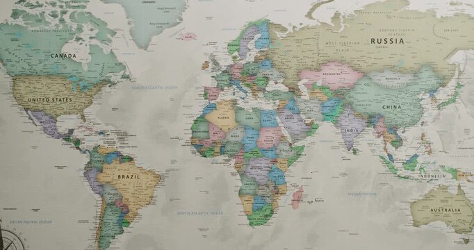 Detailed political world map with countries, capitals, and major cities displayed in muted colors, slowly panning across continents, ideal for geography, education, and global travel concepts