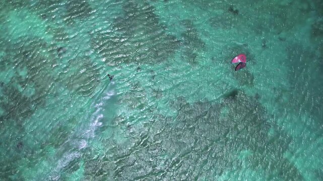 Aerial view of kitesurfer in Los Roques archipelago, Venezuela.