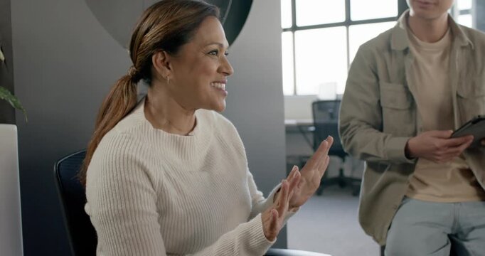 Diverse team in office huddle to plan, woman leading discussion, peer noting on tablet, copy space