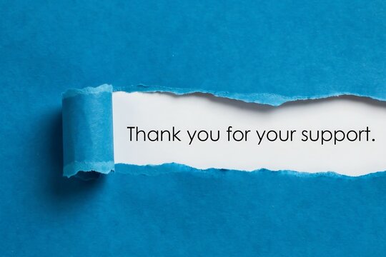 Thank you for your support message revealed through torn paper appreciation concept