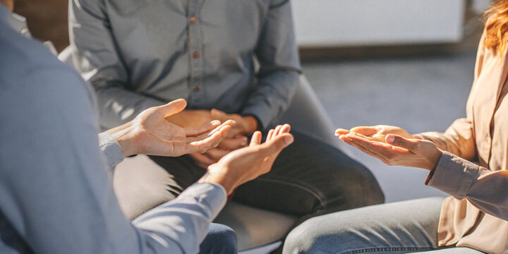 Consulting and teamwork with the hands of people who are communicating during meetings