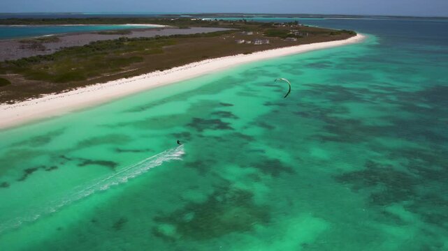 Aerial view of kitesurfer in Los Roques archipelago, Venezuela.