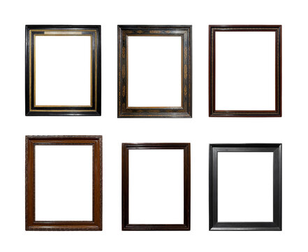 Collection of antique dark wooden picture frames isolated on white background