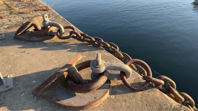 selective focus anchor chain attached to a metal shackle