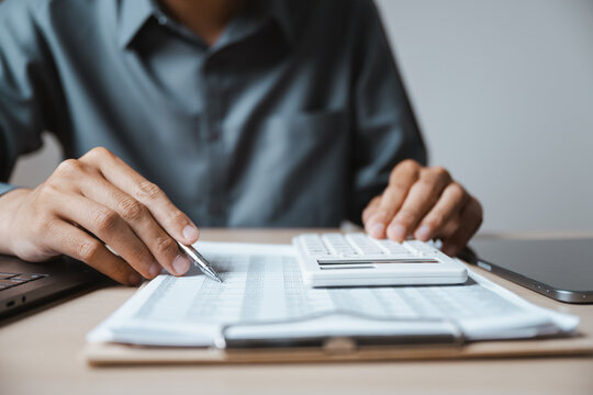 Ledger page shows audit auditing auditor budgeting business background figures, then shows audit auditing auditor budgeting business background figures in a warm soft calm bright sunlit natural room.