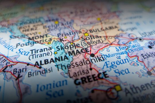 Map of North Macedonia with shadowed top and bottom. Selective focus on label, close-up view