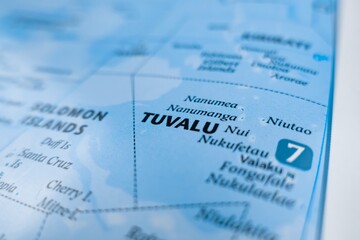 Obraz premium Map of Tuvalu styled in grey color. Selective focus on label, close-up view
