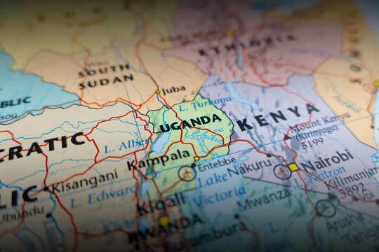 Map of Uganda with shadowed top and bottom. Selective focus on label, close-up view
