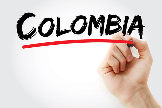 COLOMBIA text on glass written by hand. Colombia is a South American country known for its coffee, diverse landscapes including the Andes, and vibrant culture and history