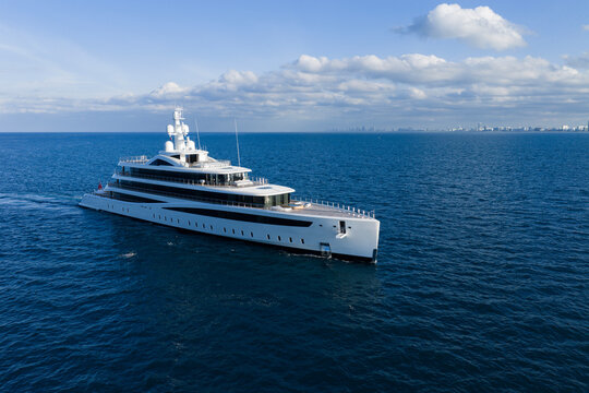 Motorboat sailing at sea. Luxury private yacht in sea. Motor yacht luxury vessel. Boat motor aerial. Vacation on summer. Aerial view motorboat. Luxury lifestyle. Vacation on summer. Yacht at sea