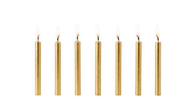 Seven gold birthday candles with lit flames isolated on transparent background