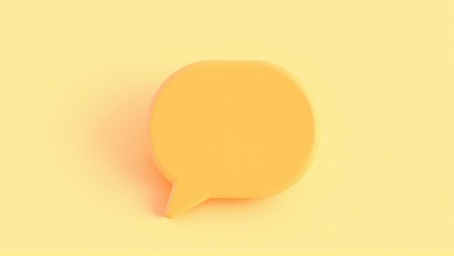 Rounded orange speech bubble rests upon pale yellow surface. Minimalist design, soft lighting creates subtle shadow. Simple communication concept.