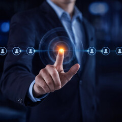 Obraz premium Businessman touching a glowing digital interface showing a global network of people connected online