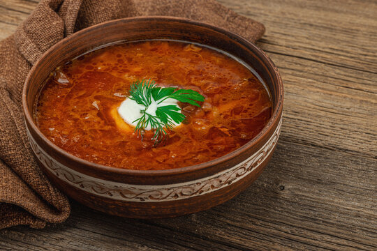 Traditional Ukrainian borscht. Hot dish, national red soup, served in classic style.
