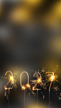 new year 2027 burning sparkler number isolated on blurred background with copy space, vertical template for digital new years eve greetings on social media