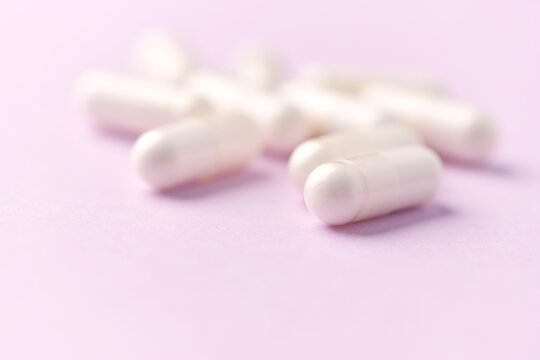 Citicoline capsules. Citicoline is a supplement that boost brain performance and improve memory. Bright background. Soft focus. Close up. Copy space