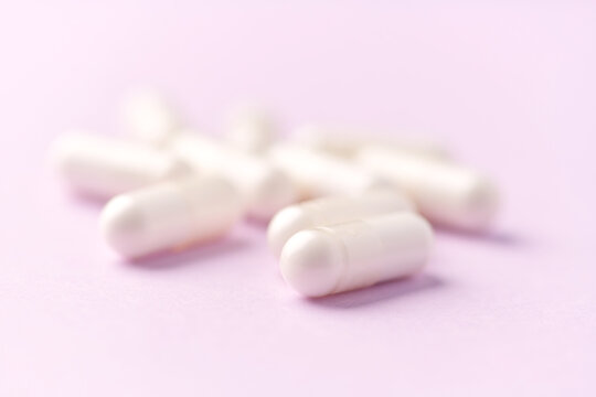 Citicoline capsules. Citicoline is a supplement that boost brain performance and improve memory. Bright background. Soft focus. Close up. Copy space