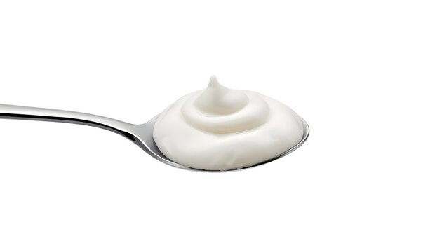 Stainless steel spoon holding a swirl of creamy white yogurt against a clean white background