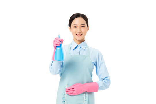 Smiling Cleaning Lady in Pink Gloves Holding Spray Bottle on White