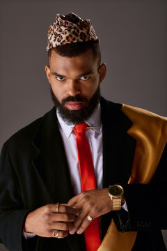Young stylish African American man showcasing vibrant fashion in a confident pose