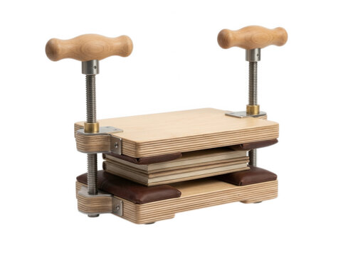 Professional wooden bookbinding press with metal screws isolated on transparent background for traditional book restoration crafts