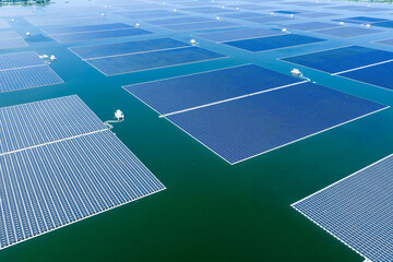 Aerial view of floating solar power station on water surface © zhangyang135769