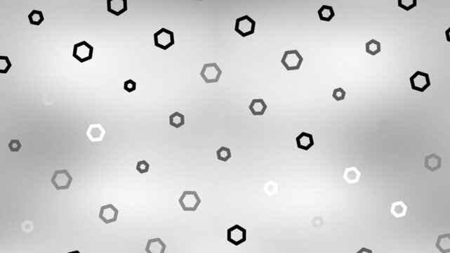Hexagons of varying sizes arranged on a gray gradient background