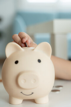 Save money. children putting coin for saving. wealth, Finance, insurance, investment, education, future, plan life, learn, banking, family, health, health and accident insurance.