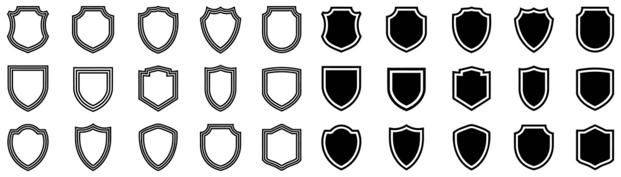 Collection of black and white shield emblems with varied shapes and double outlines