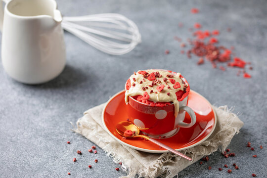 Berries cupcake from microwave in a  mug. Easy homemade dessert. Mugcake red velvet