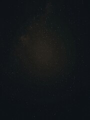 Milky Way galaxy and Sagittarius constellation glowing across a dark night sky, revealing dense stars and the galactic center. © Imalif17