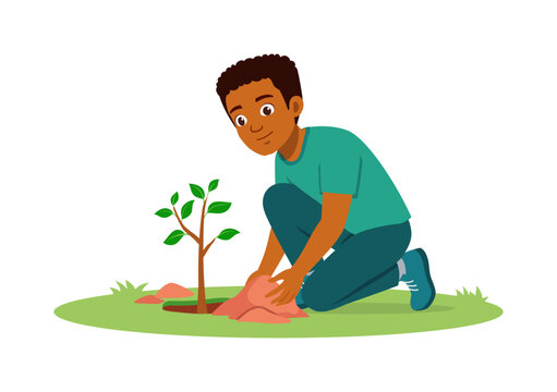Smiling African American youth planting a small tree on green grass happy with environmental care