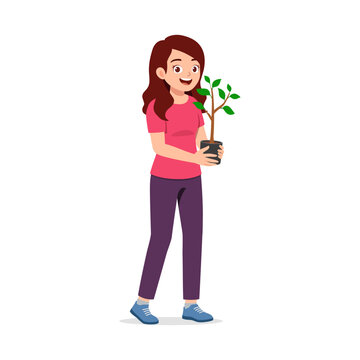 Smiling young woman happily holding a small potted plant showing care and environmental awareness