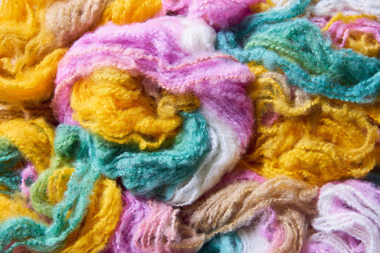 Close up of tangled colorful fuzzy wool yarn