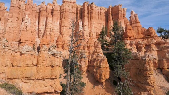 Motion shot in spectacular orange hoodoos and sandstone cliffs of bryce canyon national park in utah. Popular travel destination for unique geological formations and trails