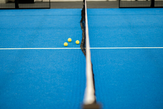 Picture of a part of interior of paddle tennis court