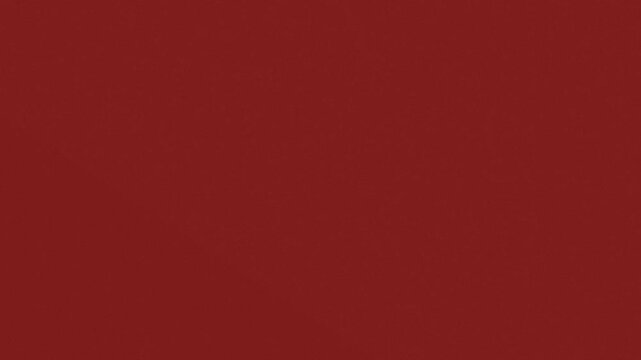Abstract curved design on solid red background