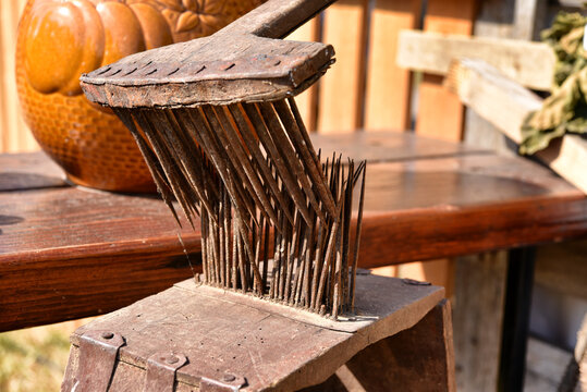 Antique flax hackle for fiber processing on display outdoors