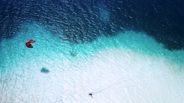 Aerial view of kite surfer in Los Roques archipelago, Venezuela.