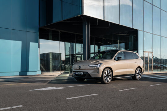 Kyiv, Ukraine - August 20, 2026: New Volvo EX90 electric car in front of blue shopping mall