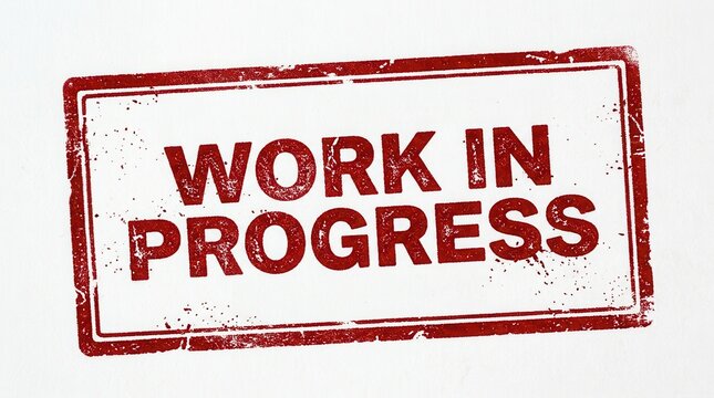 Red grunge rubber stamp with the text work in progress isolated on white