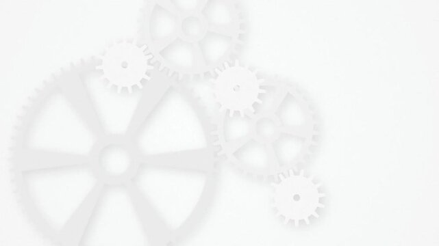 White plastic clockwork gears spinning seamless loop