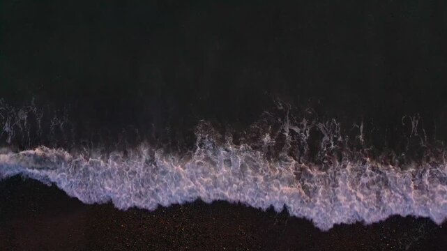 Aerial view of waves crashing on the beach, Georgia.