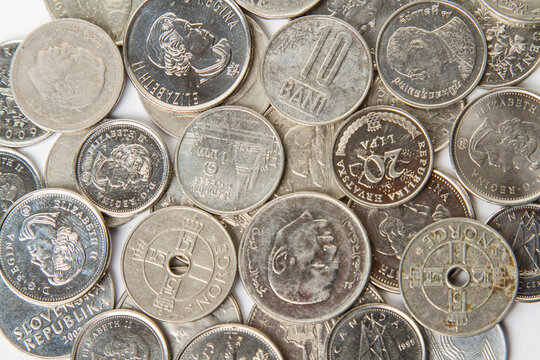Background. Close-up. Various  silver coins on a bright background.