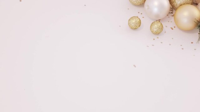 Golden Christmas Ornaments and Gifts on Beige Background