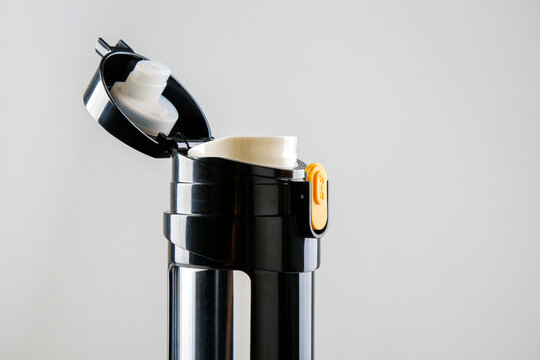 Black insulated tumbler on a white background